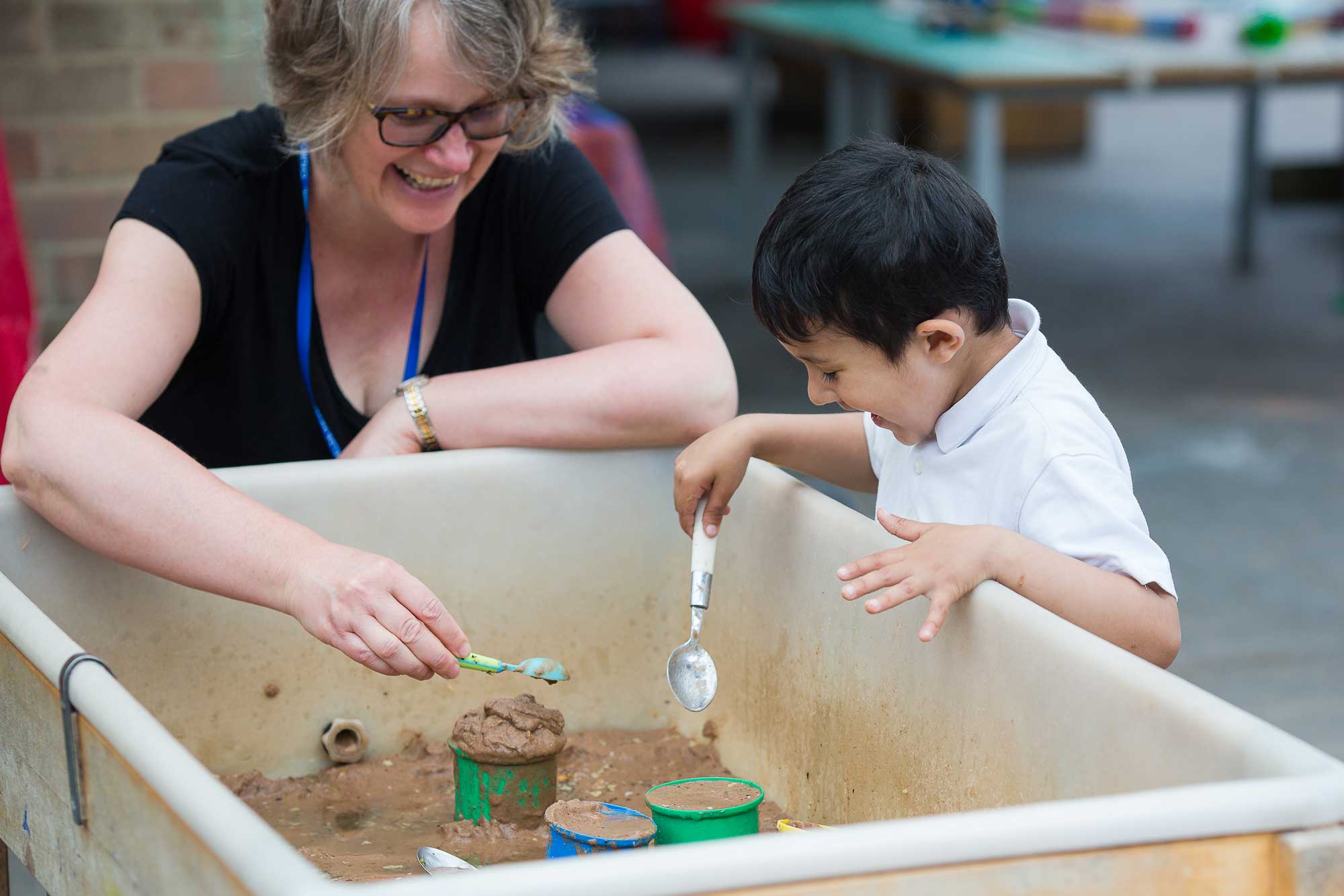 Playing with sand in the nursery